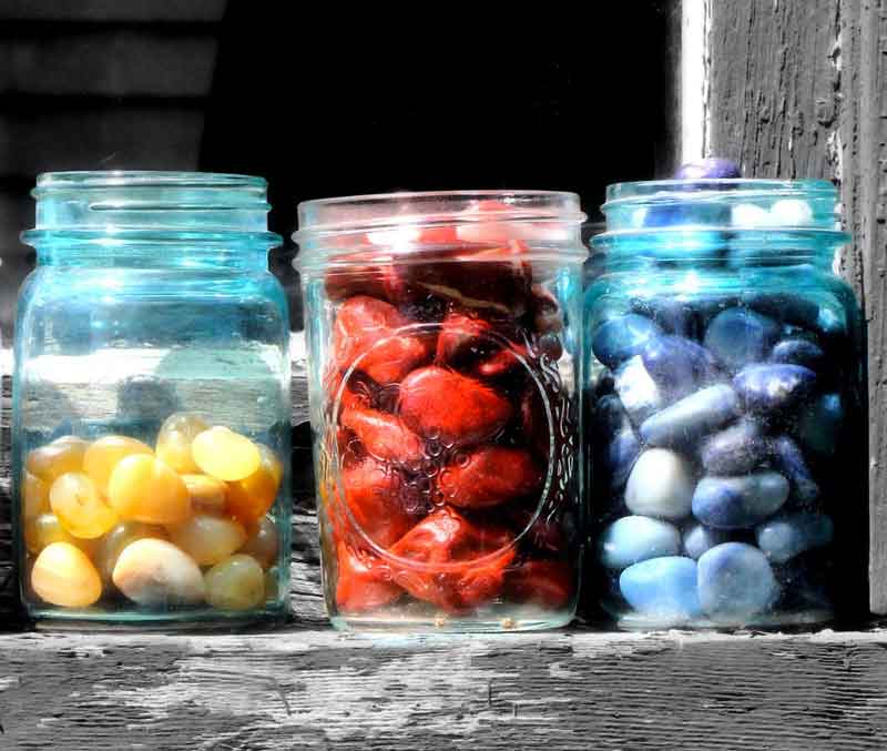 stones in jars sorted by color