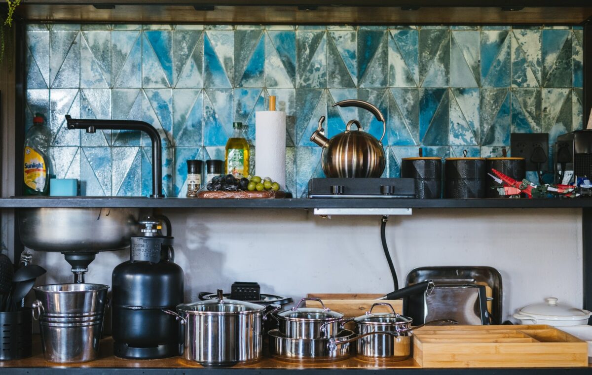 stainless steel cooking pots on stove